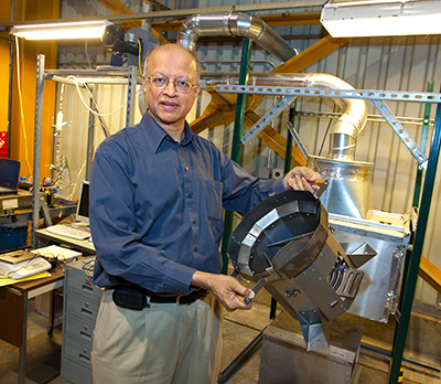 Ashok Gadgil with the Darfur Stove in the testing facility.